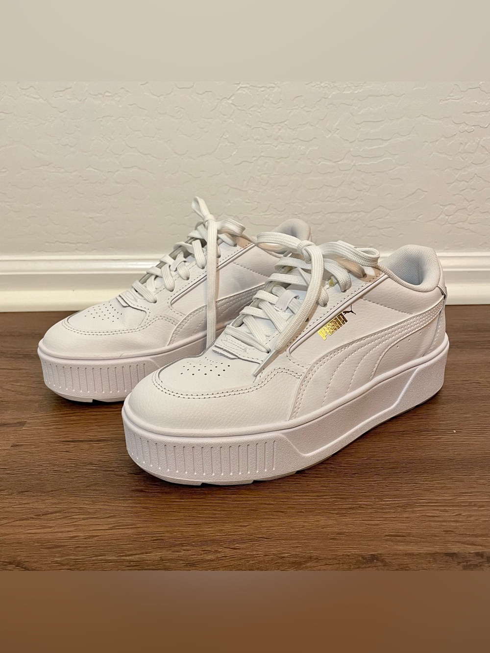 Puma Women's White Platform Sneakers with Gold Accents